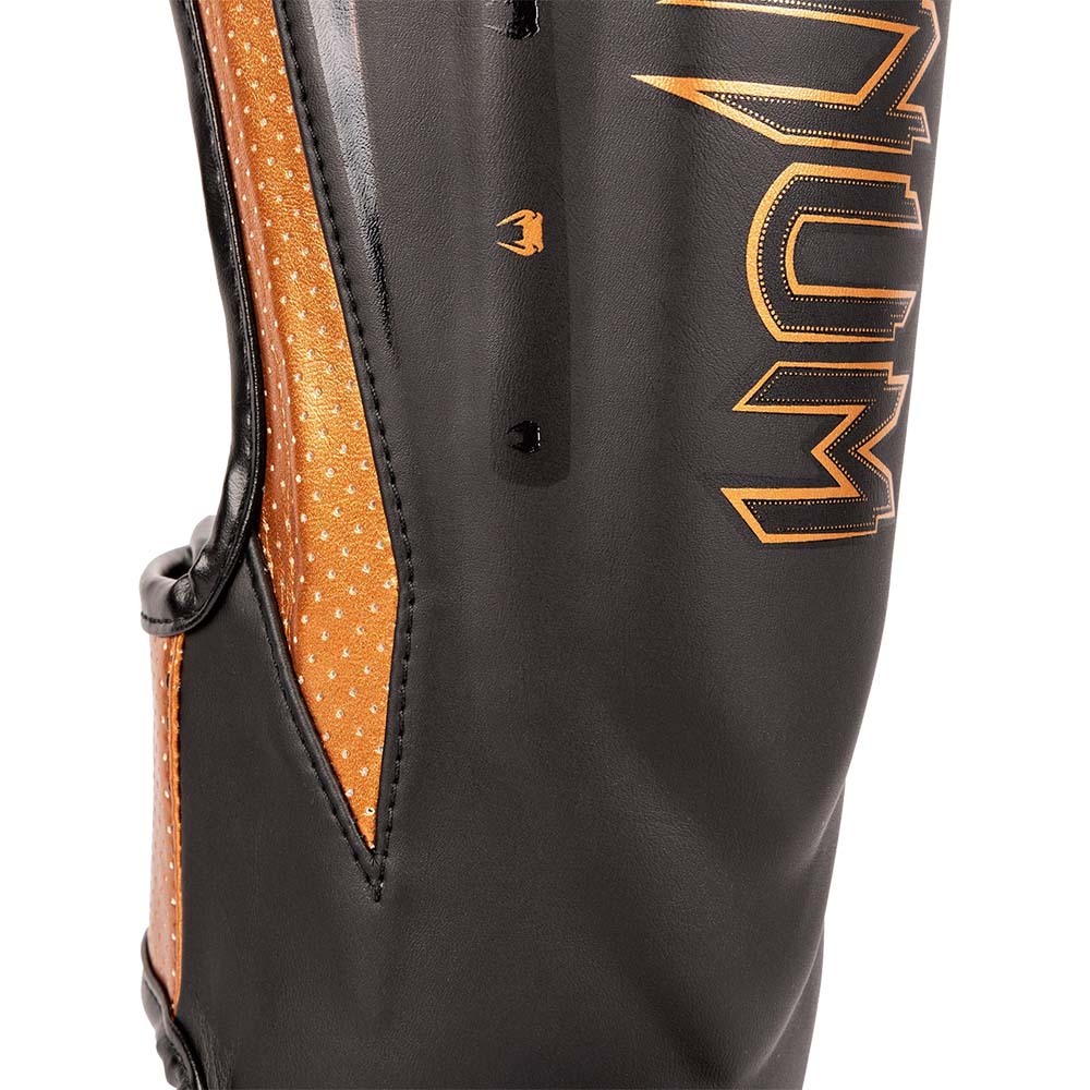 Venum Elite EVO Black/Bronze Shin Guards at FightHQ